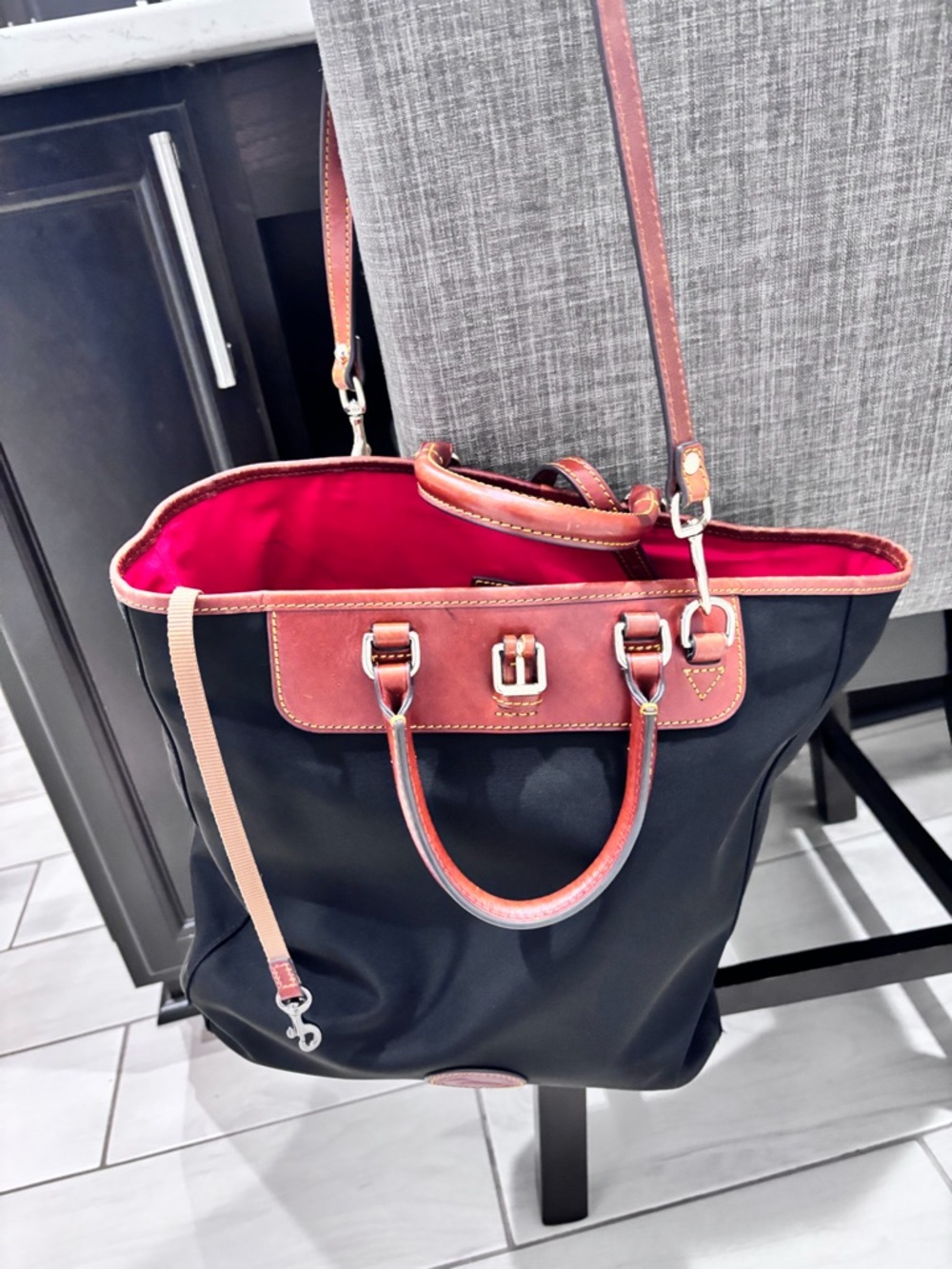 Dooney & Bourke Black Tote with Brown Trim and Pink Interior